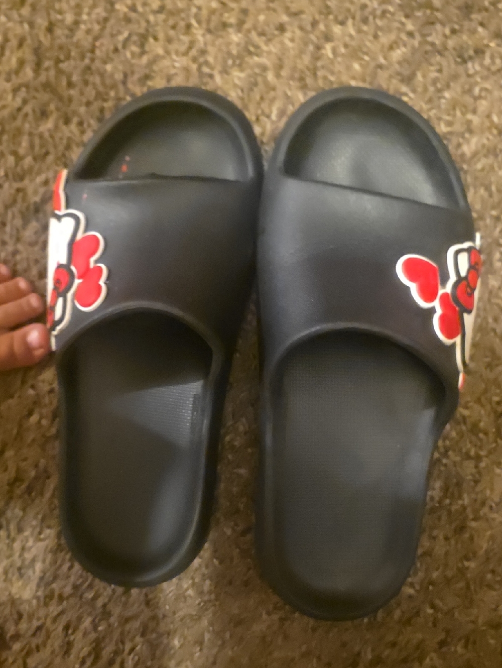Hello Kitty Black Slide Sandals with Red and White Bow Accents